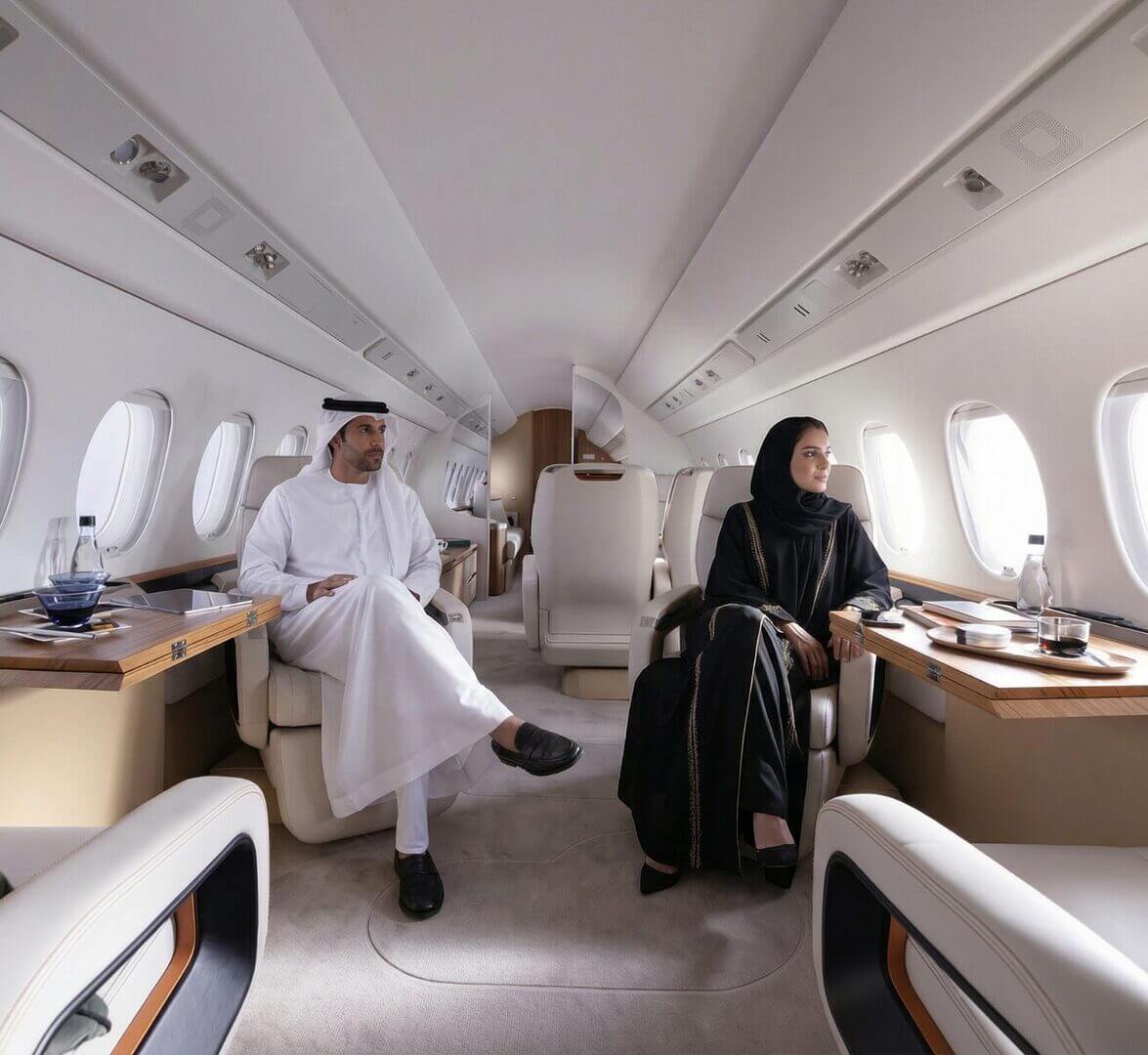 Business leaders boarding a private jet at a UAE airport