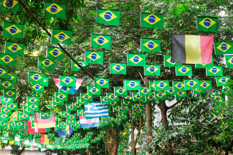 A street in Brazil decorated with dozens of Brazil flags