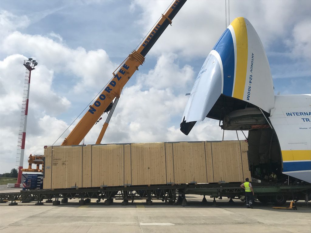Unloading wide body transport cargo aircraft